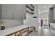 Modern laundry room with gray cabinetry, counter space, and built-in storage solutions at 275 Canterwood Ln, Mulberry, FL 33860