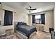 Comfortable bedroom with a ceiling fan, and neutral walls at 300 Lake Smart Cir, Winter Haven, FL 33881