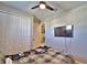 This bedroom features a ceiling fan, television, and closet at 300 Lake Smart Cir, Winter Haven, FL 33881