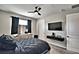 Bedroom featuring neutral walls, a ceiling fan, and natural light at 300 Lake Smart Cir, Winter Haven, FL 33881