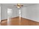 Bright bedroom featuring hardwood floors and ample closet space at 3102 Pebble Bend Dr, Lakeland, FL 33810