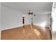 Spacious living room featuring wood floors, neutral walls, and a ceiling fan at 3102 Pebble Bend Dr, Lakeland, FL 33810