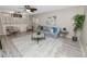 Open living room showcasing a comfortable sofa, stylish decor, and ample natural light at 327 Corona Del Mar St, Lakeland, FL 33809