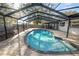 Relaxing enclosed in-ground pool with ample deck space, ideal for enjoying warm days and outdoor living at 327 Corona Del Mar St, Lakeland, FL 33809