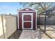 New shed with painted door at 327 Corona Del Mar St, Lakeland, FL 33809