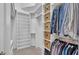 Organized walk-in closet with custom shelves, clothing rods, and woven storage baskets at 3978 Viamonte Ln, Lakeland, FL 33810