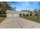 Well maintained single story home featuring a long driveway and an attached two car garage at 4550 Old Colony Rd, Mulberry, FL 33860