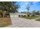 Well maintained single story home with a long driveway leading to an attached two car garage at 4550 Old Colony Rd, Mulberry, FL 33860