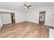 Spacious living room with wood flooring and vaulted ceiling at 4550 Old Colony Rd, Mulberry, FL 33860