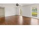 Bright bedroom with wood floors and natural light from many windows at 4624 Kings Point Ct, Lakeland, FL 33813