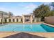 Refreshing pool with brick trim and oasis themed swing at 4624 Kings Point Ct, Lakeland, FL 33813