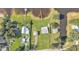 Expansive aerial view of multiple homes with private docks on a large waterfront property at 5418 Cooper Ln, Fort Meade, FL 33841