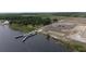 Aerial view of the community boat ramp and parking, providing access to the serene lake, surrounded by nature at 5418 Cooper Ln, Fort Meade, FL 33841
