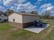 Exterior of garage with a boat parked on an adjacent pad at 5418 Cooper Ln, Fort Meade, FL 33841