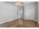 This bedroom features hardwood floors and a double-door closet at 5623 Superior Dr, Lakeland, FL 33805