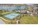 Aerial view of the tennis courts, pool and clubhouse enhance this community at 5623 Superior Dr, Lakeland, FL 33805