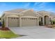 Charming single-story home with a three-car garage and well-manicured landscaping at 5623 Superior Dr, Lakeland, FL 33805