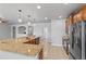 Kitchen area with stainless steel appliances, granite countertops, and pendant lighting at 5623 Superior Dr, Lakeland, FL 33805