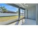 Screened patio featuring concrete floors, ceiling fan, and view of the fenced-in yard at 5806 Valentino Way, Lakeland, FL 33812