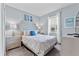 Bedroom featuring a bed, two side tables with lamps, and window at 6160 Broad Oak Dr, Davenport, FL 33837