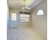 Bright bedroom featuring large windows and a ceiling fan at 6193 Magpie Dr, Lakeland, FL 33809