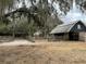 Exterior view of the barn and fencing used for horses at 6615 Broken Arrow S Trl, Lakeland, FL 33813