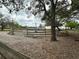 Exterior view of the land with horse fencing and a platform with stairs at 6615 Broken Arrow S Trl, Lakeland, FL 33813