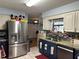 Kitchen featuring stainless steel appliances, granite countertops, and a decorative backsplash at 6615 Broken Arrow S Trl, Lakeland, FL 33813