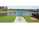 Scenic lake view with a private boat ramp and dock at 7410 Locksley Ln, Lakeland, FL 33809