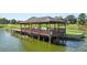 Photo of dock and boat ramp to water at 7410 Locksley Ln, Lakeland, FL 33809