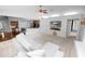 The expansive living room boasts an open floor plan and a convenient kitchen view at 7410 Locksley Ln, Lakeland, FL 33809