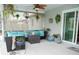 Relaxing screened patio with cozy seating, perfect for outdoor living at 7965 Kaitlin Cir, Lakeland, FL 33810