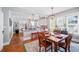 Charming dining area featuring a wooden table and a view of the well-appointed kitchen at 815 Success Ave, Lakeland, FL 33801