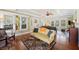 Bright and airy living room featuring hardwood floors, ceiling fan, and a doorway at 815 Success Ave, Lakeland, FL 33801