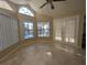 Bright breakfast nook with large windows overlooking the pool area, enhanced by tile flooring at 838 Lakeshore Dr, Polk City, FL 33868