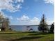 Scenic waterfront view with private dock and gazebo at 838 Lakeshore Dr, Polk City, FL 33868