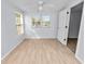 Bright bedroom offers natural light and wood-look flooring at 118 W Northside Dr, Lake Wales, FL 33853