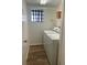 Laundry room with full-sized washer and dryer and storage at 14 Buck Cir # 14, Haines City, FL 33844