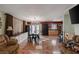 Open dining room space with tile floors, built-in cabinets, and French doors leading to the yard at 144 Mirror Nw Ln, Winter Haven, FL 33881