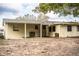 Spacious backyard with a covered patio, perfect for outdoor entertaining at 1548 Churchill Ct, Lakeland, FL 33801