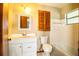 Bathroom featuring a shower and tub, white vanity, and a medicine cabinet at 1548 Churchill Ct, Lakeland, FL 33801