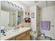 Bathroom featuring a shower/tub combination and a single sink vanity at 1706 Tressel Ct, Winter Haven, FL 33881