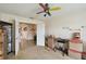 Spacious bedroom with walk through archway and neutral walls at 1706 Tressel Ct, Winter Haven, FL 33881