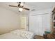 View of a bedroom featuring a closet and ceiling fan at 1706 Tressel Ct, Winter Haven, FL 33881