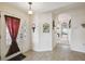 Inviting home entryway with decorative details and neutral wall paint at 1706 Tressel Ct, Winter Haven, FL 33881