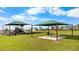 Shaded playground and picnic area in a well-maintained community park at 2027 Airedale Way, Lake Alfred, FL 33850