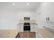 Kitchen with stainless steel appliances and bright, white cabinets at 2161 Maple Hill Ct, Lakeland, FL 33811