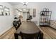 Inviting dining room with wood floors and kitchen view at 2326 Eastmeadows Rd, Lakeland, FL 33812