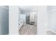 View of a bathroom with a shower stall with white subway tile and vanity with white drawers at 2521 Coral Way, Lakeland, FL 33801
