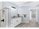 Light filled bathroom featuring a granite topped vanity and a glass enclosed shower at 2521 Coral Way, Lakeland, FL 33801